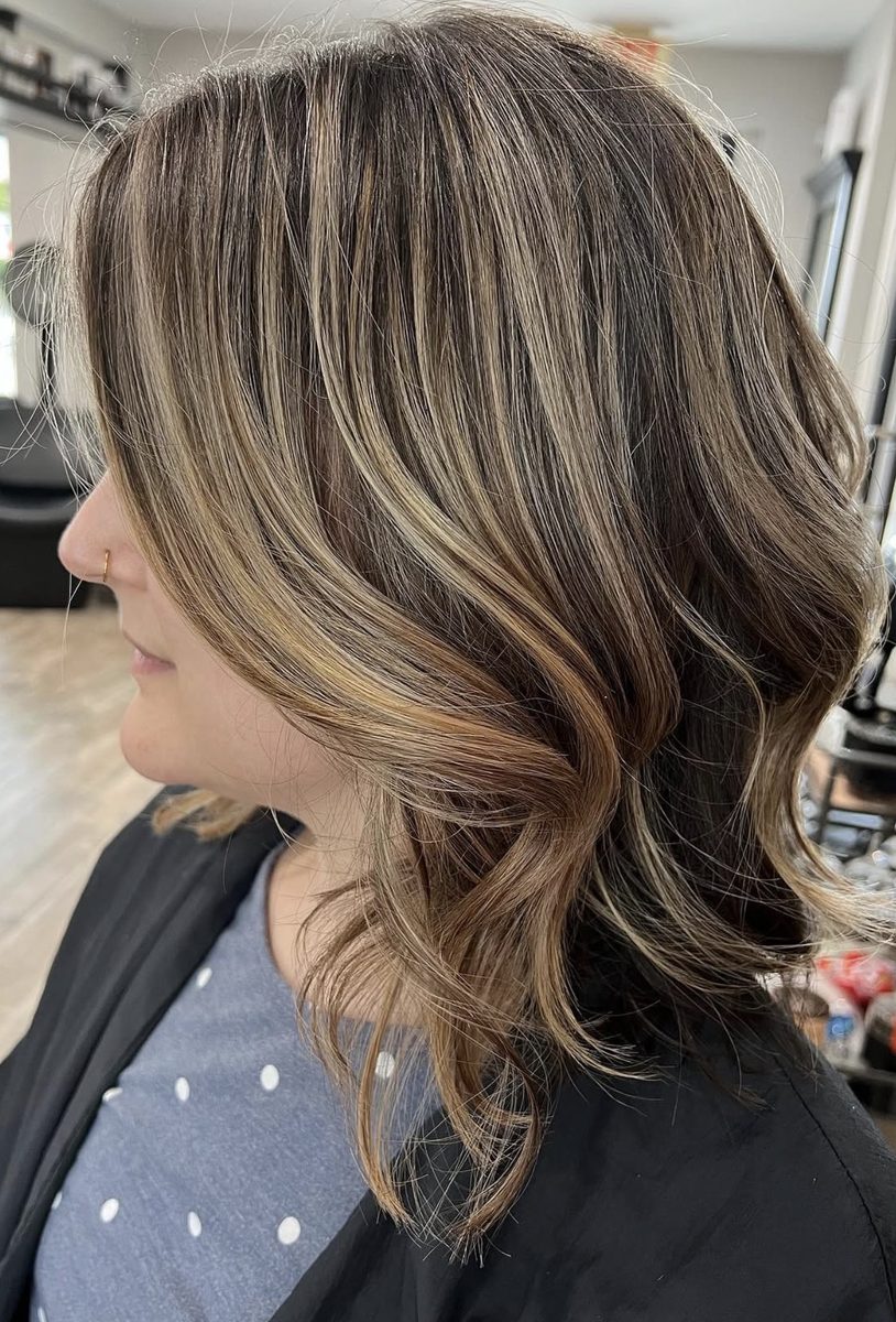 Bronde balayage with caramel highlights and waves